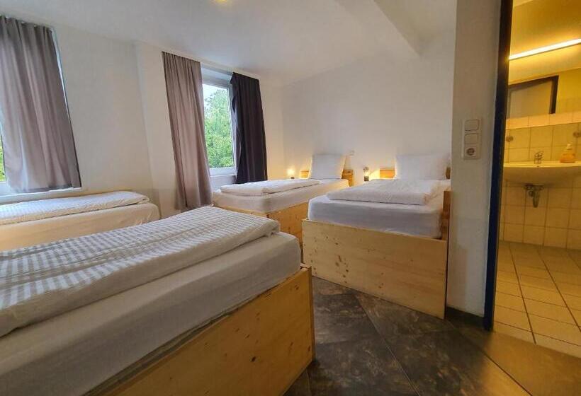 Quarto Quádruplo Estandar, Ambiente By Next Inn