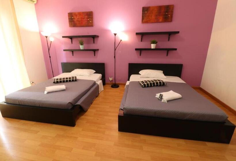 اتاق استاندارد چهارنفره با سرویس بهداشتی مشترک, Guest House Pirelli Milano