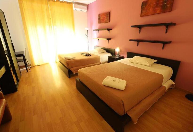 اتاق استاندارد چهارنفره با سرویس بهداشتی مشترک, Guest House Pirelli Milano