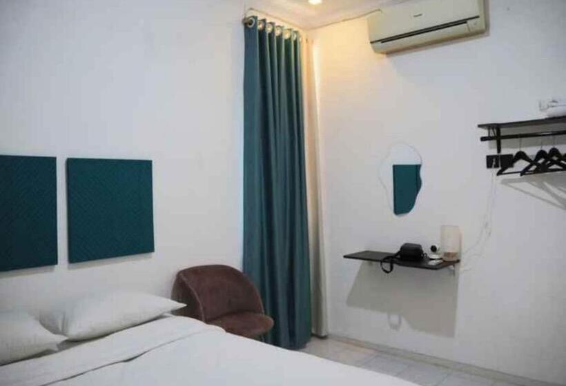 Номер Deluxe Кровать Кинг, Oyo 93311 Pesona Orange Homestay