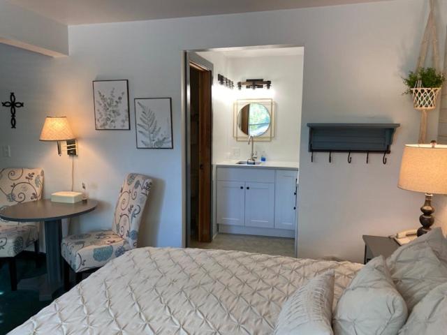 Quarto Deluxe Cama King, Moose Creek Lodge & Suites