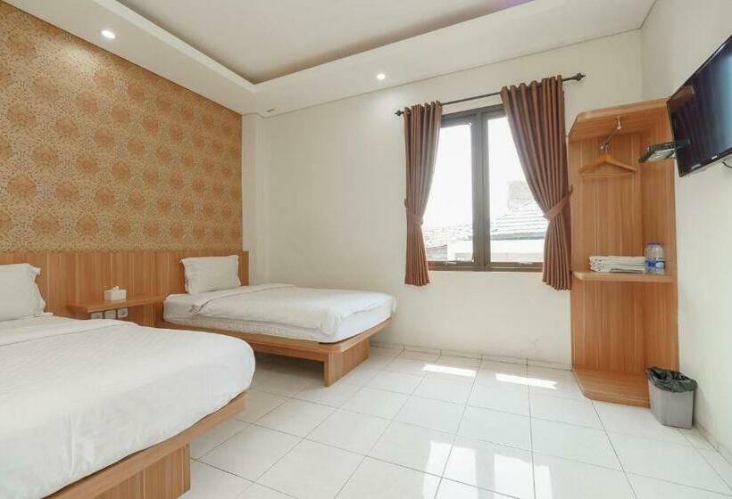家庭间, Green Apple Residence Near Sarinah Mitra Reddoorz