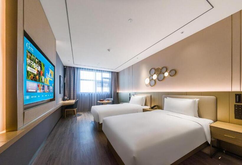 Номер Deluxe, Orange Hotel   Jiaozhou Jiaodong International Airport Jiaodong Subway Station
