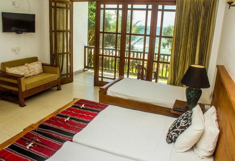 Quarto Triplo Deluxe Vista Mar, Serendib Beach