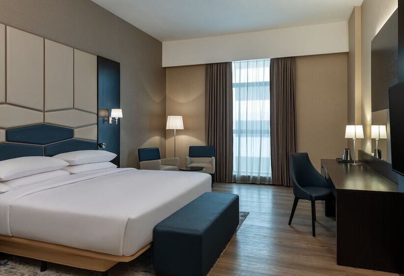 Номер Deluxe, Four Points By Sheraton Production City, Dubai