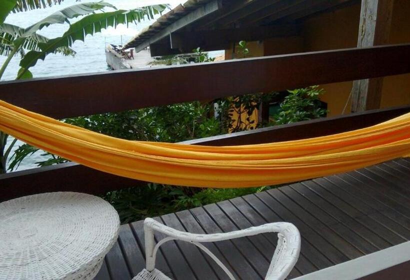 Habitación Triple Estándar Vista Mar, Pousada Casa Do Bicho Preguiça