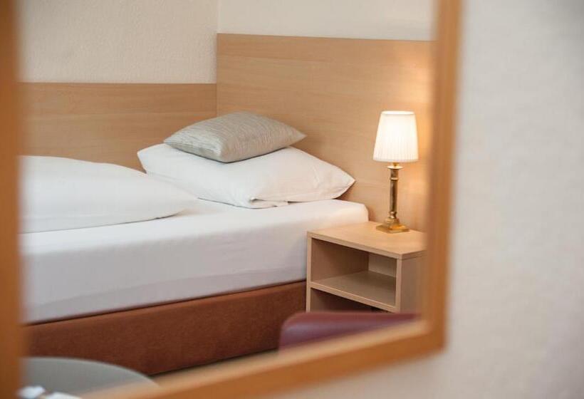 Quarto Estandar Individual, Comfort Garni Stadtzentrum