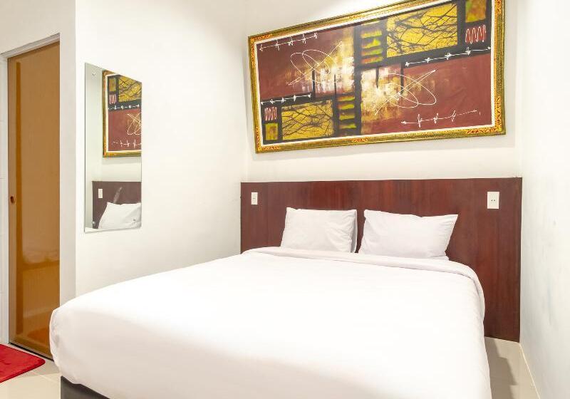 Номер Deluxe, Urbanview Os Residence Medan By Reddoorz