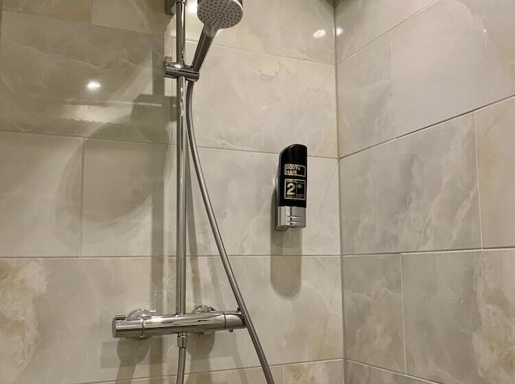 Habitació Triple Estàndard, Damrak Inn