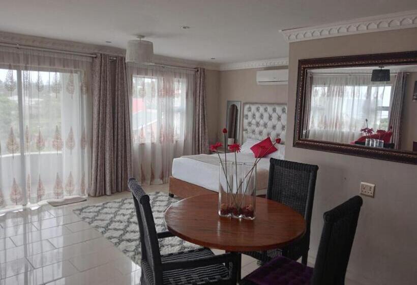 Quarto Estandar Vista Jardim, La Saville Bnb