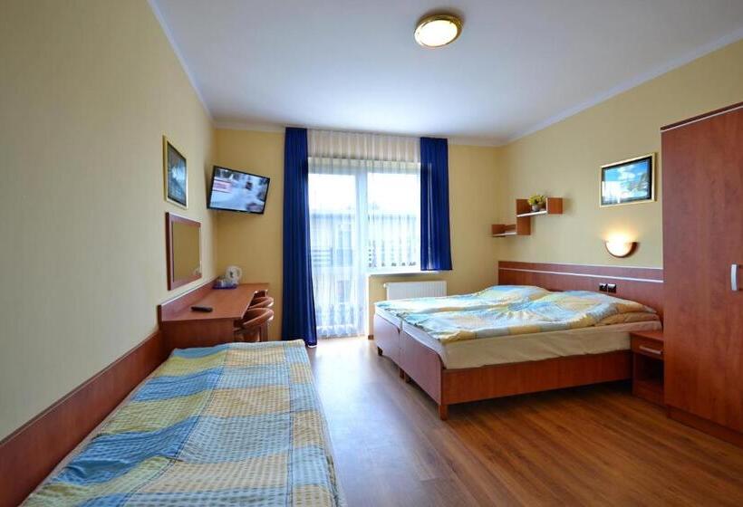 Quarto Triplo Estandar com Sacada, Riwiera Dźwirzyno