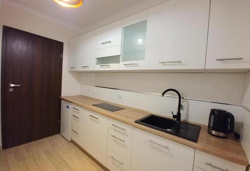Quarto Quadruple Standart com Varanda, Riwiera Dźwirzyno