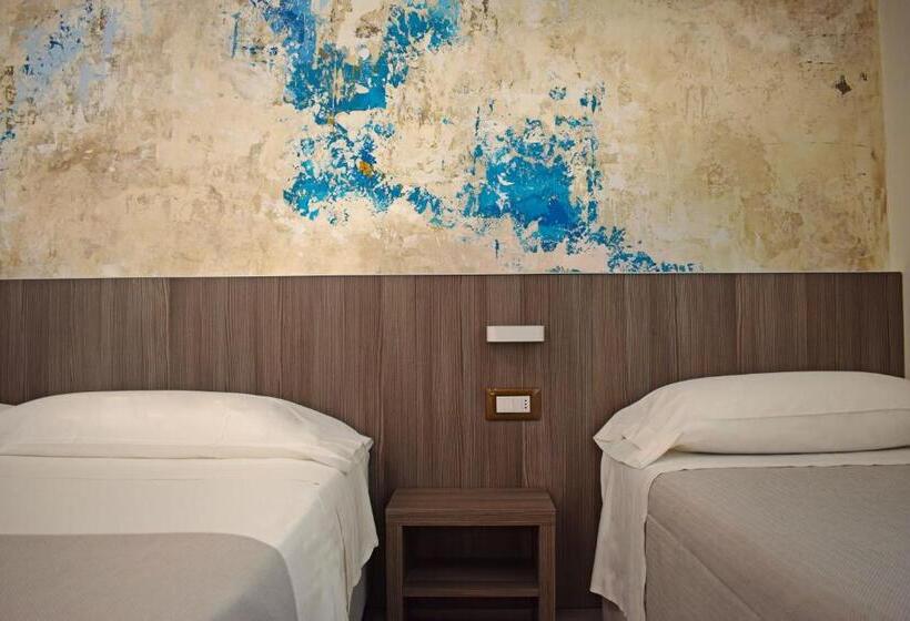 Quarto Triplo Economy, Muccioli