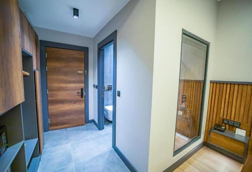 Quarto standart vista jardim, Aksular