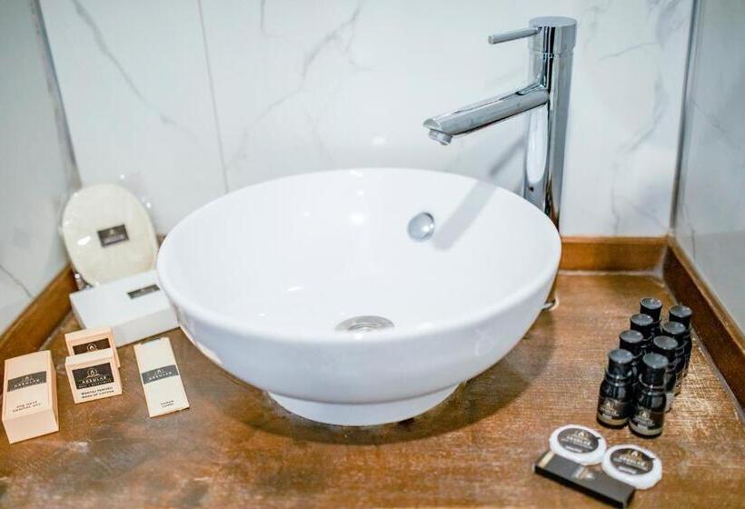 Quarto standart vista jardim, Aksular