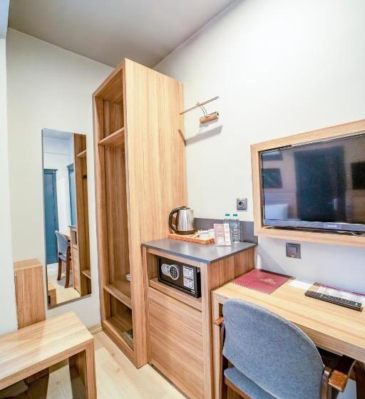 Quarto Triplo Standard Vista Jardim, Aksular