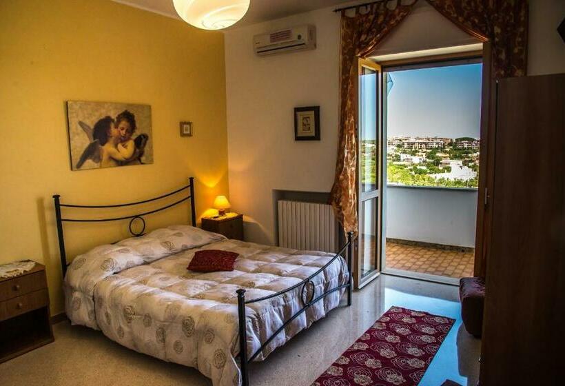 带阳台标准四人间, B&b Casa Mariangi
