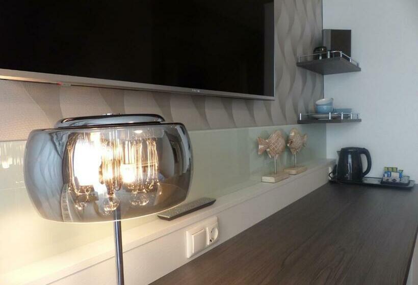 Quarto Estandar, Strand