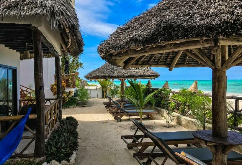 غرفة ديلوكس مطلّة علي البحر مزوَّدة بشُرفة, Jambiani White Sands Bungalows