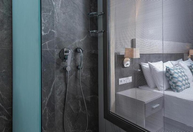 اتاق سوپریور با چشم‌انداز باغ, Dionysos Hotel & Suites