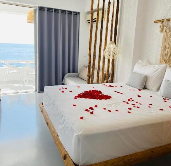 Quarto Triplo Deluxe Vista Mar, Geo & Art Boutique