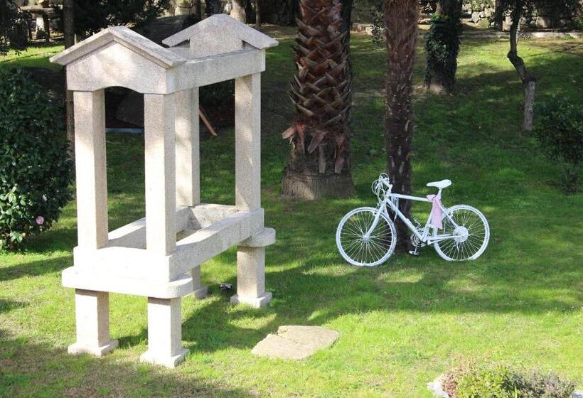 اتاق استاندارد چهارنفره با چشم‌انداز باغ, Turismo Homes Solar Do Areal