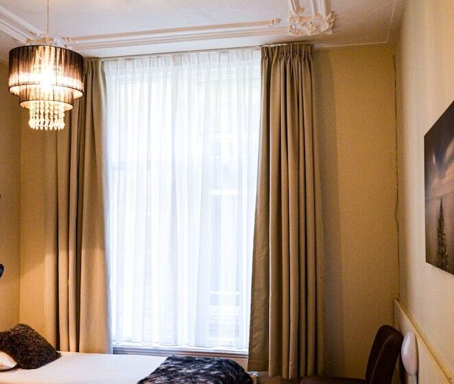 اتاق استاندارد سه تخته با سرویس بهداشتی مشترک, Family Hotel Kooyk