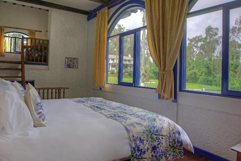 디럭스 패밀리 룸, Hostería Hacienda Pinsaqui