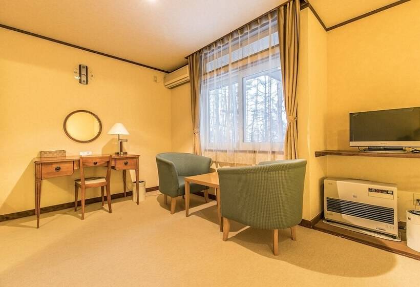 اتاق استاندارد چهار تخته, Petit Hotel Enchante