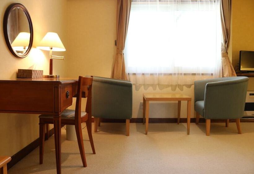 اتاق استاندارد چهار تخته, Petit Hotel Enchante