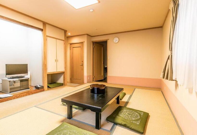 اتاق استاندارد چهار تخته, Petit Hotel Enchante