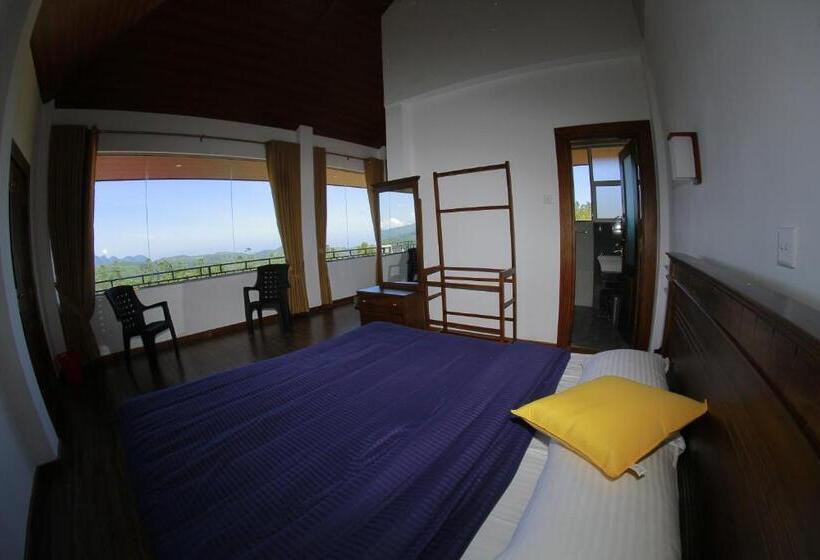 Quarto Deluxe com Sacada, Daynish Rock Bungalow