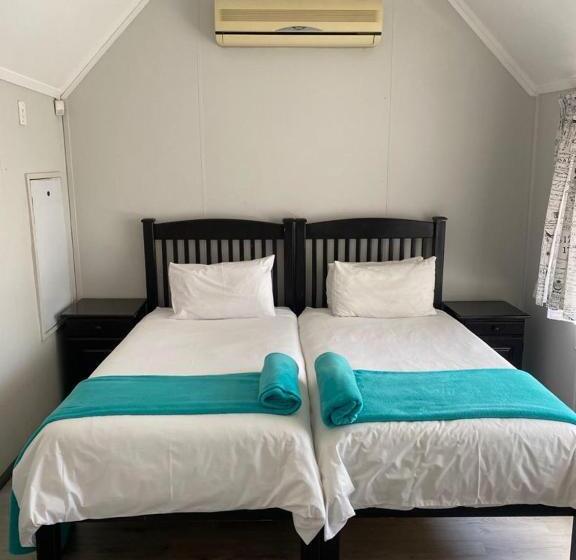 اتاق لوکس با چشم‌انداز باغ, Ndzuti Guest House