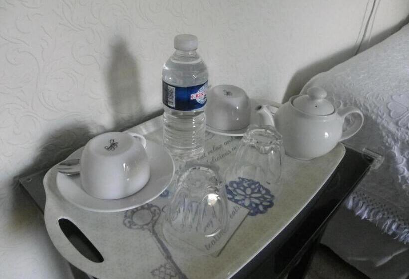 اتاق خانوادگی با چشم‌انداز باغ, Maison Dieu Guest House
