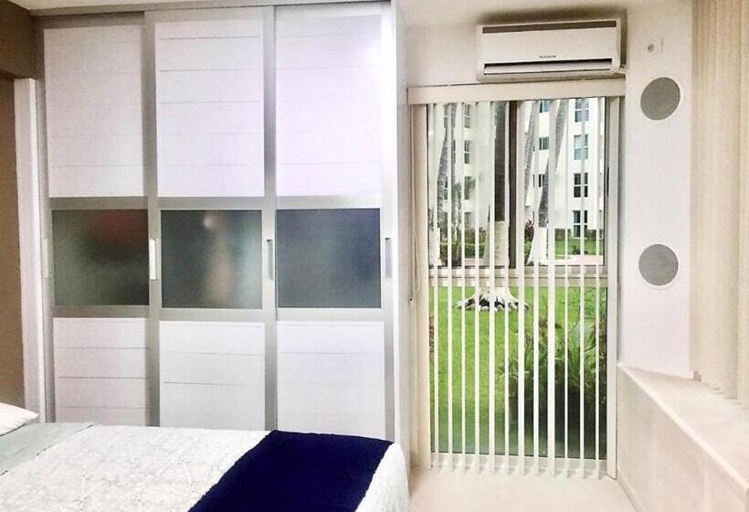 Quarto Familiar Vista Jardim, Marina Suites By Andiani Travel