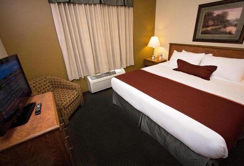 キングサイズベッドのデラックスルーム, Service Plus Inns & Suites Drayton Valley