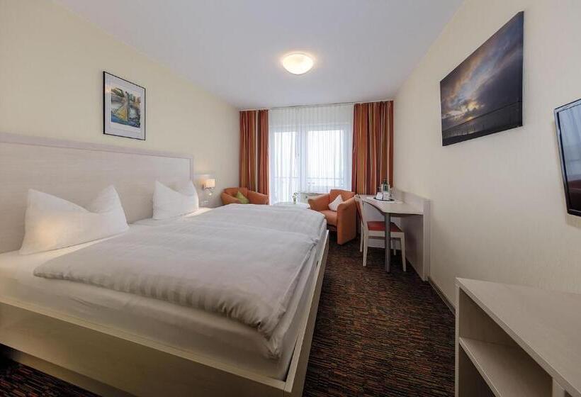 اتاق راحتی با چشم‌انداز دریا, Strandhotel Wietjes