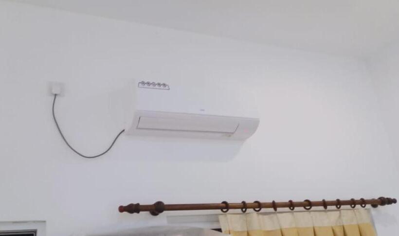 اتاق استاندارد با چشم‌انداز باغ, Petit Guest House