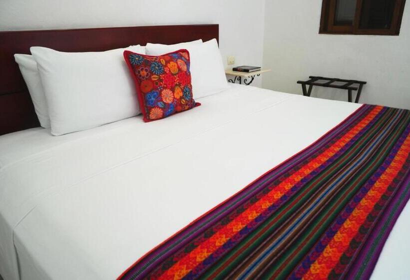 מיטת קינג בסוויטה, Merida Santiago Hotel Boutique