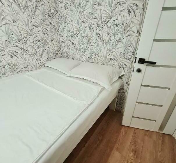 اتاق اکونومی, Hostel Caps Home