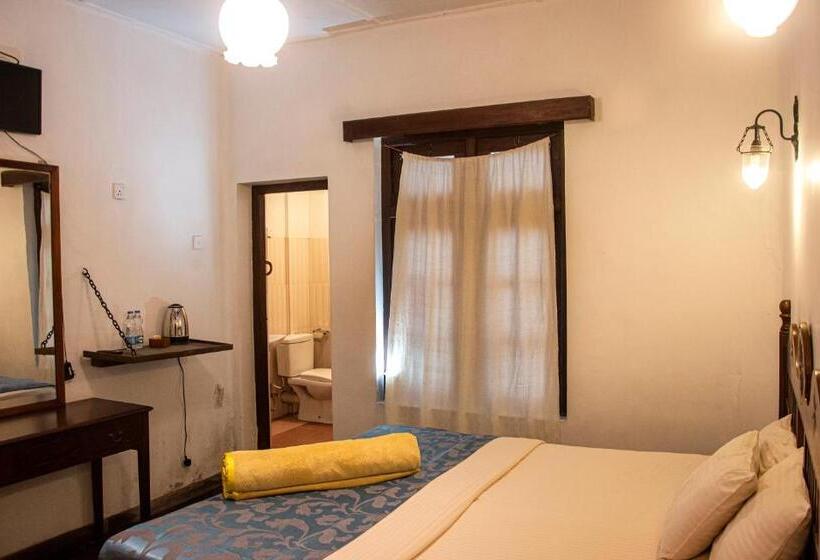 Quarto Triplo Deluxe, The Golf Green City Bungalow