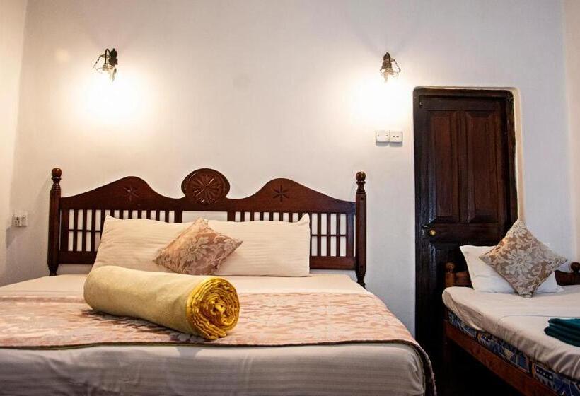 Quarto Triplo Deluxe, The Golf Green City Bungalow