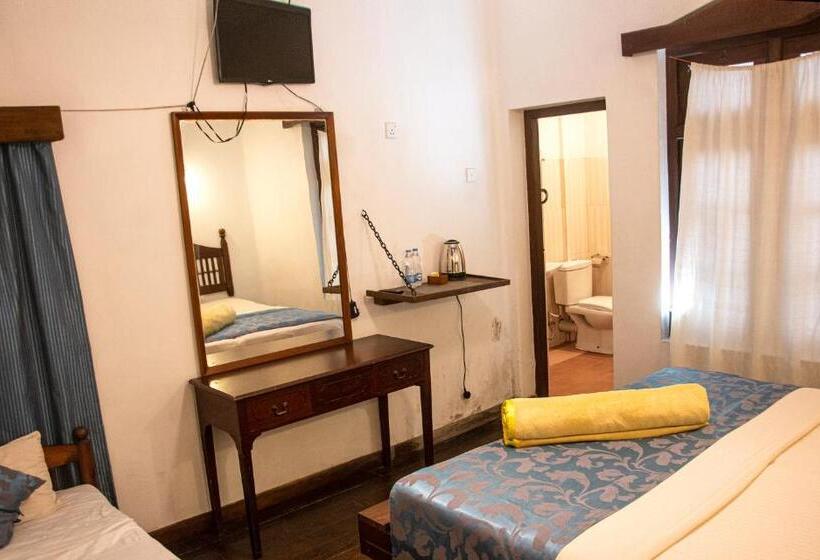 Quarto Triplo Deluxe, The Golf Green City Bungalow