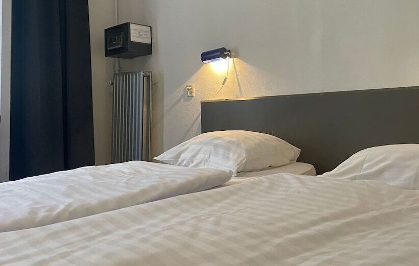 Quarto Triplo Deluxe, City