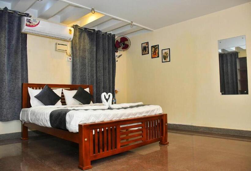 Quarto Deluxe, Revive Inn Pondy   Rooms & Villa