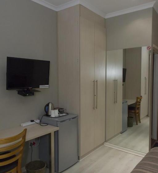 Номер Deluxe Кровать Куин, The Suburban Guest House