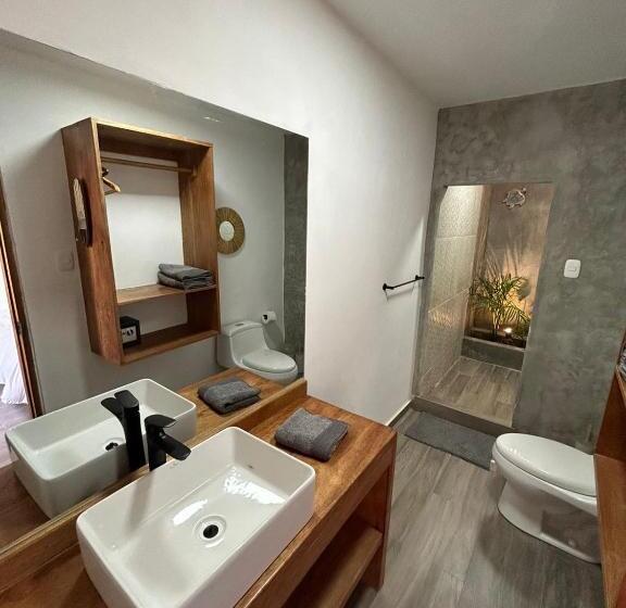 Quarto Quadruple Standart Vista Jardim, Casa Canoa