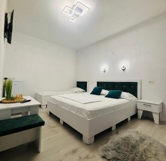 Quarto Triplo Estandar, Casa Coman