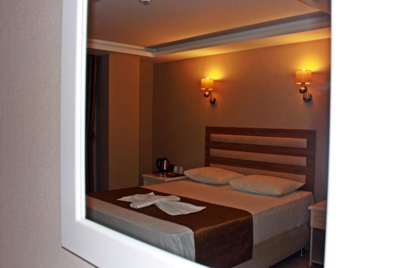 Quarto standard vista mar lateral, Feza Otel
