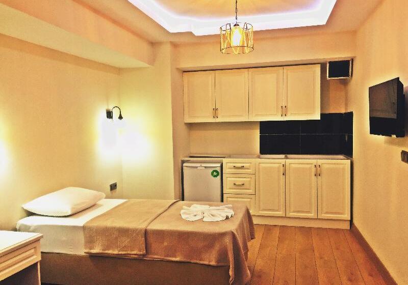 Quarto Triplo Economy, Feza Otel